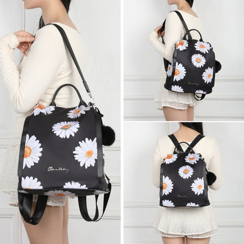 Mochila antirrobo Impermeable para mujer (14.80L) | Mochila Convertible en bolso con pompón y asa desmontable de adorno Margaritas