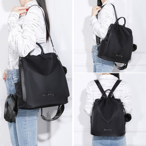Mochila antirrobo Impermeable para mujer (14.80L) | Mochila Convertible en bolso con pompón y asa desmontable de adorno Negro
